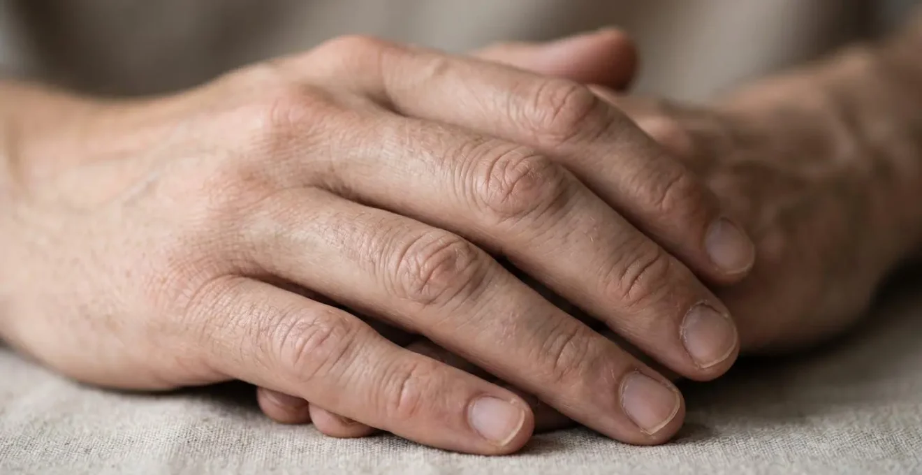 Close-up of hands in grounded gesture during mindful breathing practice