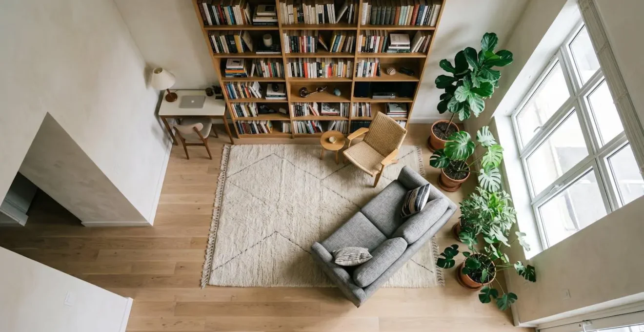 Overhead view of furniture arrangement creating acoustic zones in apartment